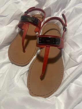 Coach Red Leather T‑Strap Sandals with Black Logo Plate